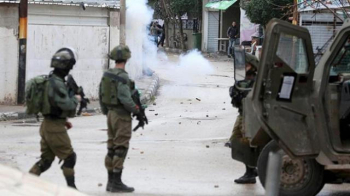 İsrail Güçleri İşgal Altındaki Batı Şeria'da 16 Filistinliyi Gözaltına Aldı