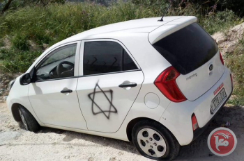 Israeli settlers vandalize vehicles, spray death threats near Nablus