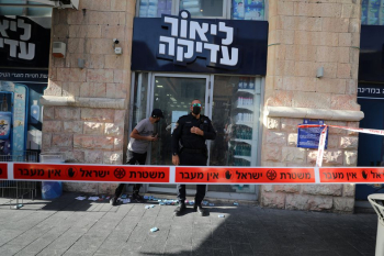 Palestinian stabs two in Jerusalem shop before being shot