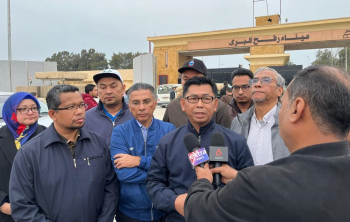 A Malaysian parliamentary delegation arrives at the Rafah Crossing